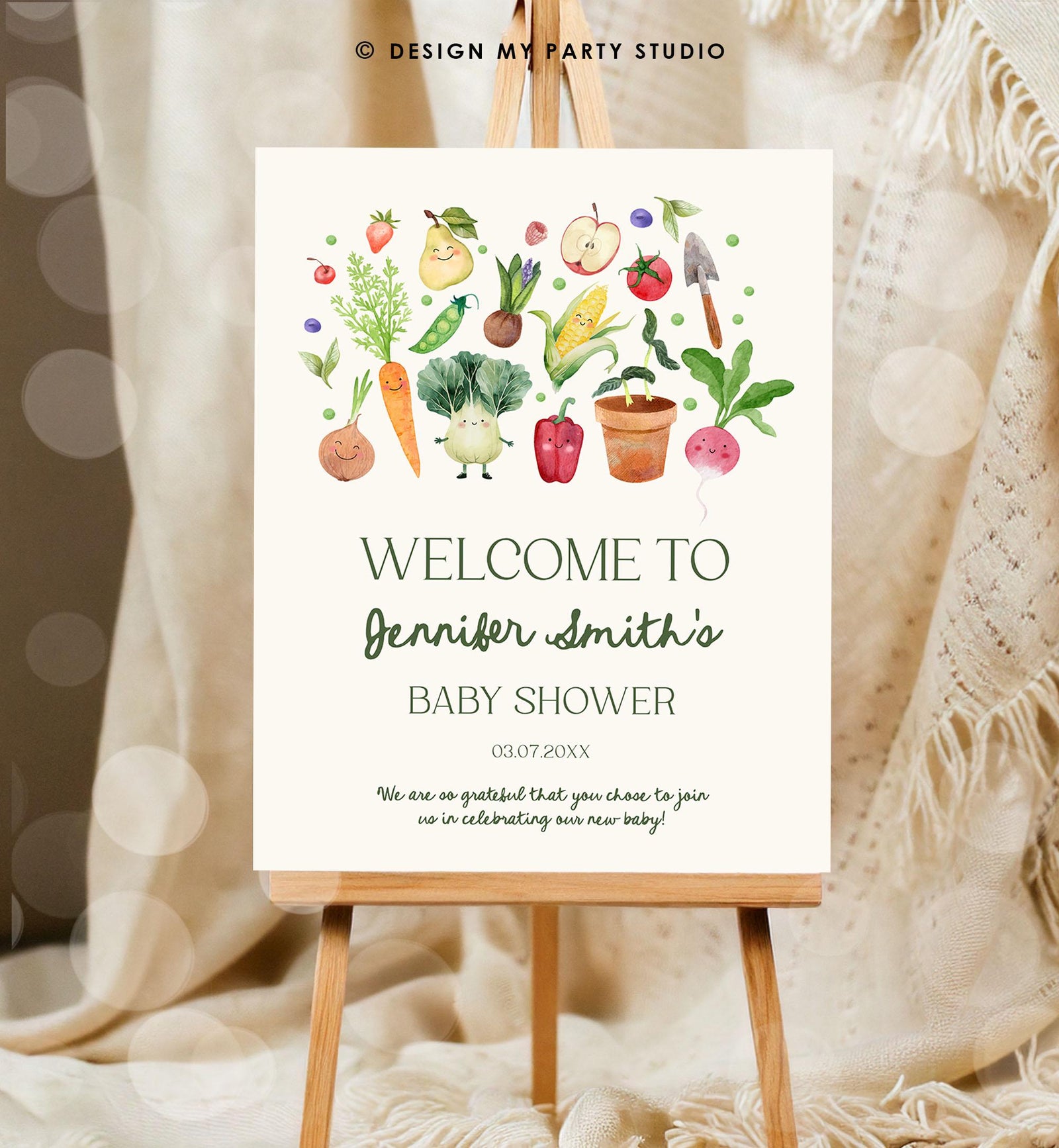 May include: A welcome sign for a baby shower with a green and white color scheme. The sign has a watercolor illustration of various vegetables and fruits with smiling faces. The text on the sign reads 'Welcome to Jennifer Smith's Baby Shower 03.07.20XX We are so grateful that you chose to join us in celebrating our new baby!'.