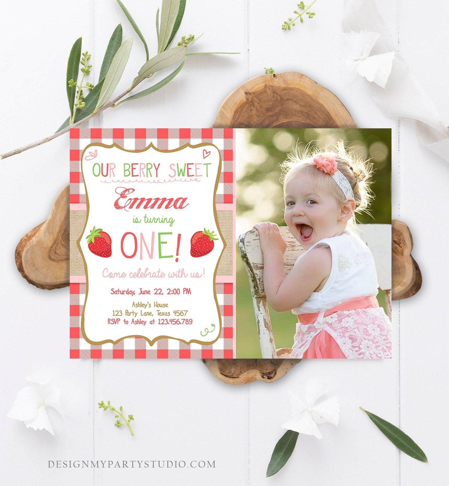 May include: A pink and white gingham patterned birthday invitation with a photo of a young girl. The invitation says 'Our Berry Sweet Emma is turning ONE! Come celebrate with us!' and includes details for the party, including the date, time, location, and RSVP information.