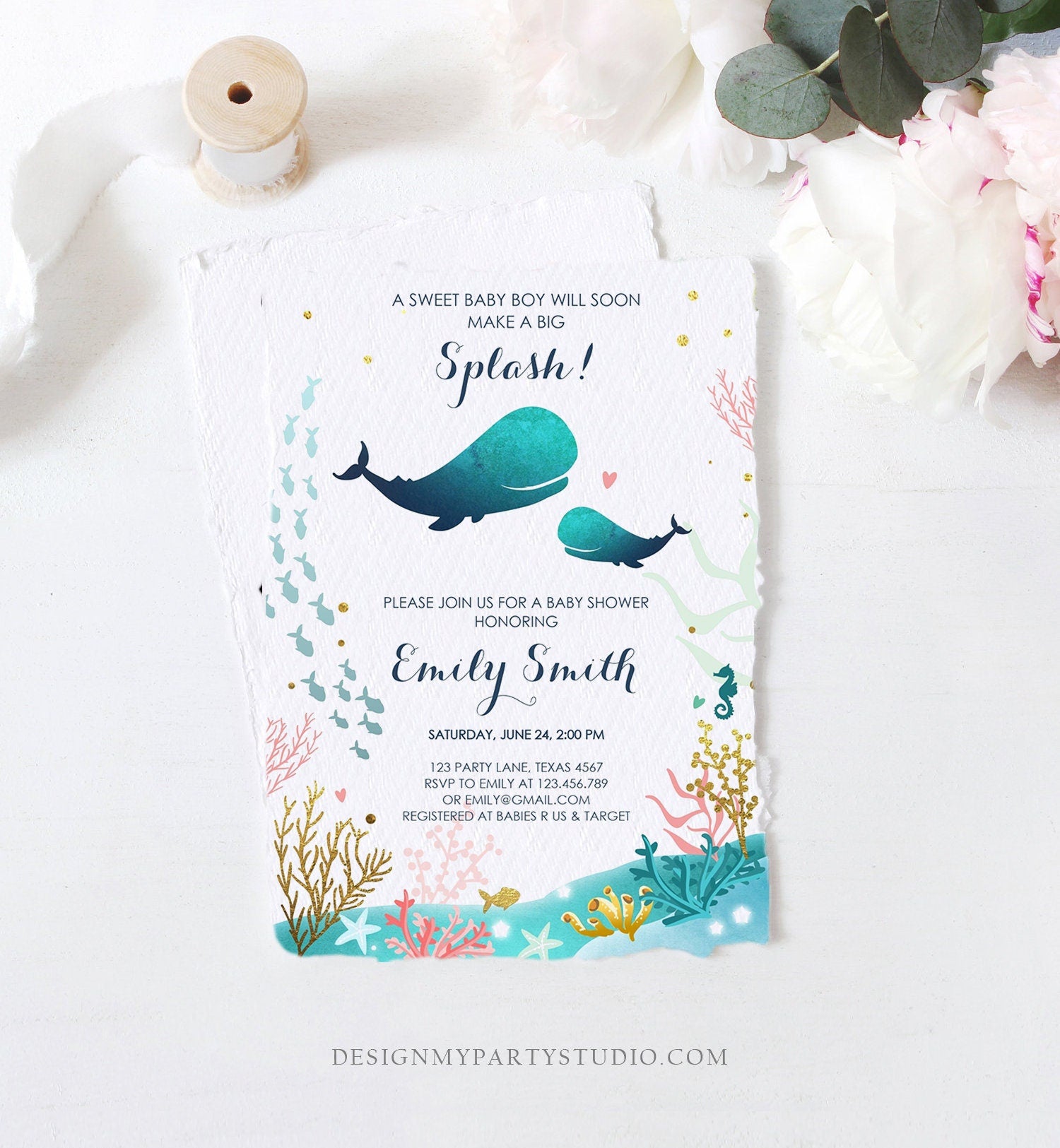 May include: A baby shower invitation with a blue whale and sea life theme. The invitation has a blue watercolor background with gold glitter and coral. The text reads 'A sweet baby boy will soon make a big Splash!' 'Please join us for a baby shower honoring Emily Smith' 'Saturday, June 24, 2:00 PM' '123 Party Lane, Texas 4567' 'RSVP to Emily at 123.456.789 or emily@gmail.com' 'Registered at Babies R Us & Target' 'DesignMyPartyStudio.com'