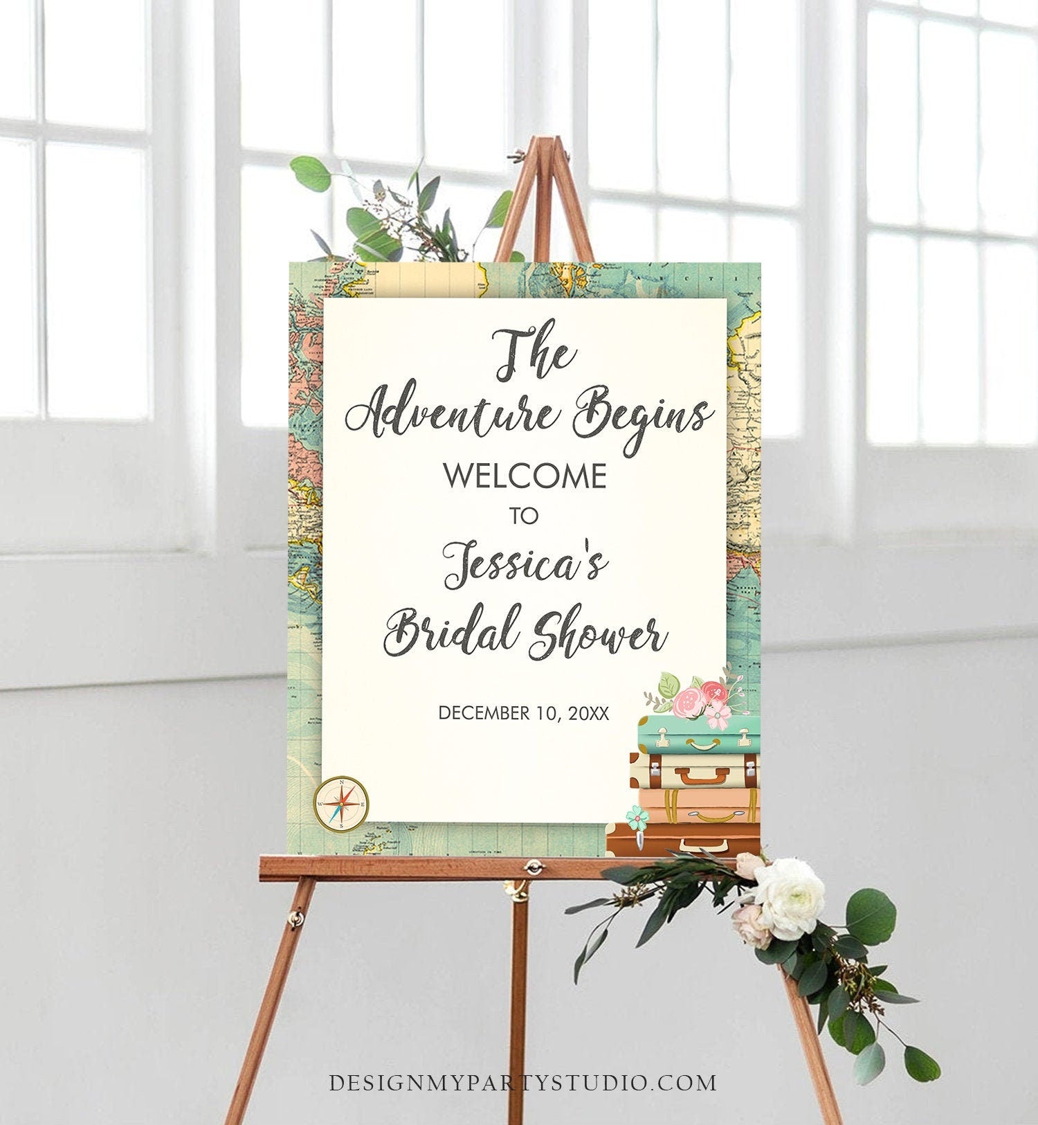 May include: A welcome sign for a bridal shower with a travel theme. The sign has a vintage world map background with a compass and suitcases. The text on the sign reads &#39;The Adventure Begins Welcome to Jessica&#39;s Bridal Shower December 10, 20XX&#39;.