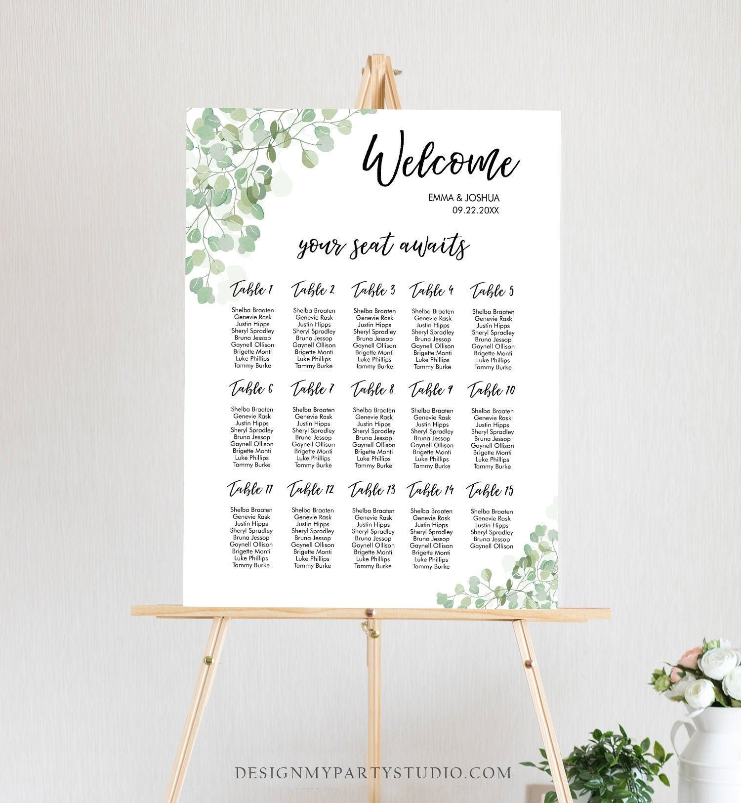 May include: A white wedding seating chart with a green leafy design. The chart is titled &#39;Welcome&#39; with the names &#39;Emma & Joshua&#39; and the date &#39;09.22.20XX&#39;. The chart lists the names of guests assigned to each table number from 1 to 15.