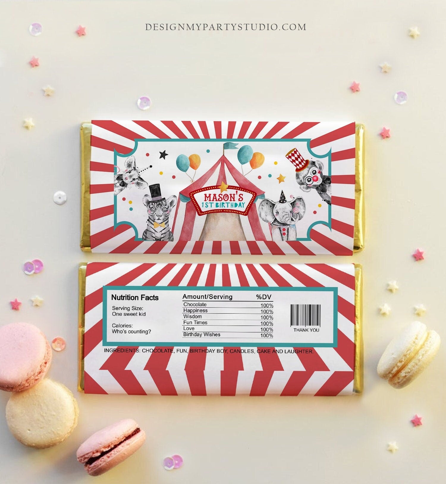 May include: A red and white striped chocolate bar wrapper with a circus theme. The wrapper features a tent, a tiger, an elephant, and a monkey. The text on the wrapper reads &#39;Mason&#39;s 1st Birthday&#39;.