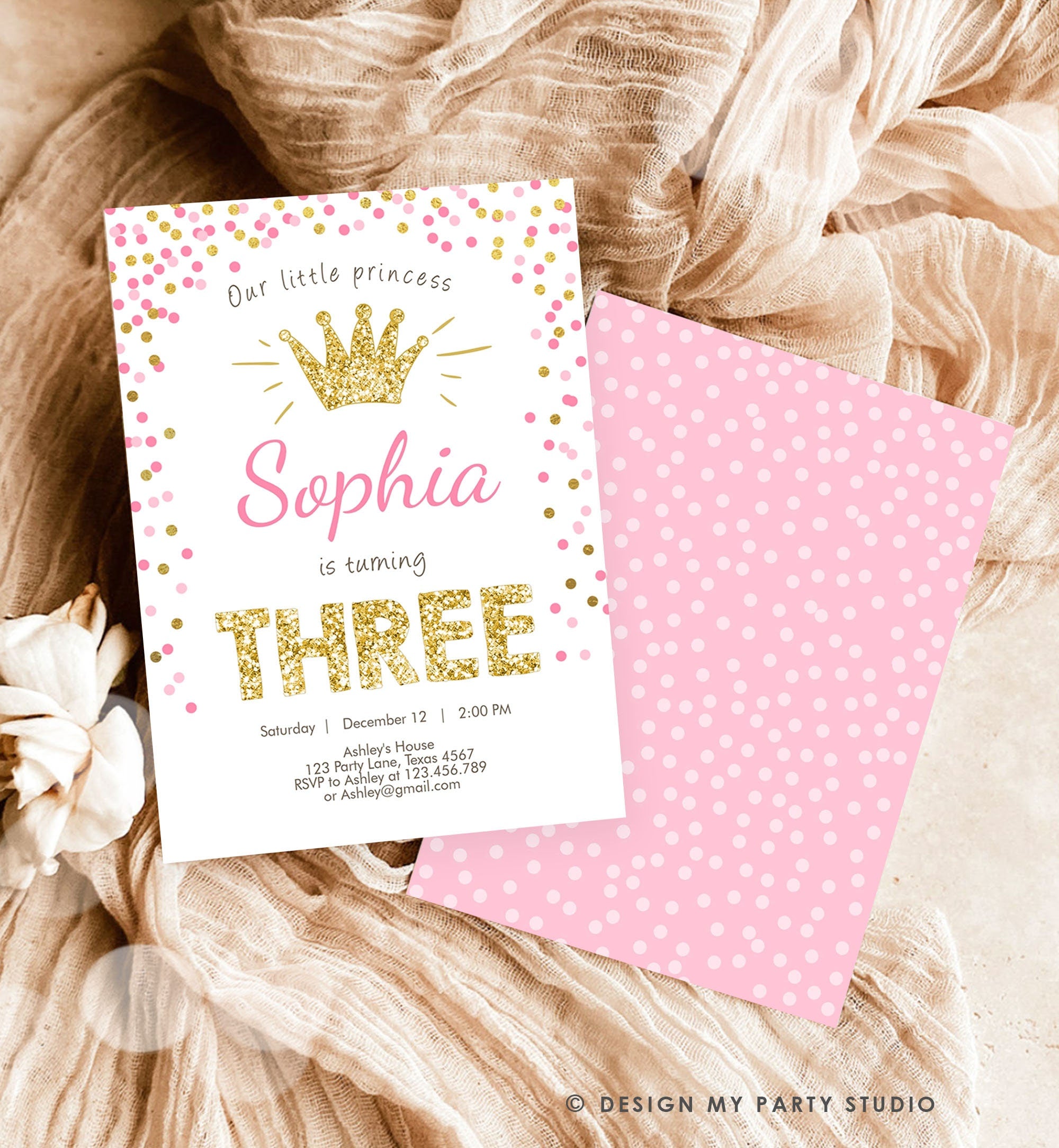 May include: A pink and gold birthday invitation with gold glitter text that says &#39;Our little princess Sophia is turning THREE&#39;. The invitation has a gold glitter crown and pink and gold confetti. The text also includes the date, time, and location of the party, as well as RSVP information.