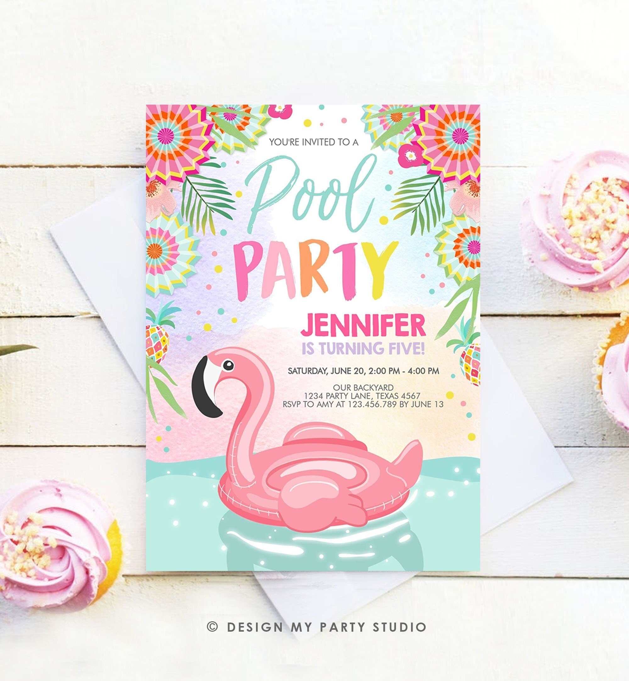 May include: Two pink flamingo pool float invitations with a tropical theme. The invitations have a light blue background with pink, yellow, and green flowers and leaves. The text on the invitations reads &#39;You&#39;re invited to a Pool Party&#39;, &#39;Jennifer is turning five!&#39;, &#39;Saturday, June 20, 2:00 PM - 4:00 PM&#39;, &#39;Our Backyard&#39;, &#39;1234 Party Lane, Texas 4567&#39;, &#39;RSVP to Amy at 123.456.789 by June 13&#39;, and &#39;Design My Party Studio&#39;.