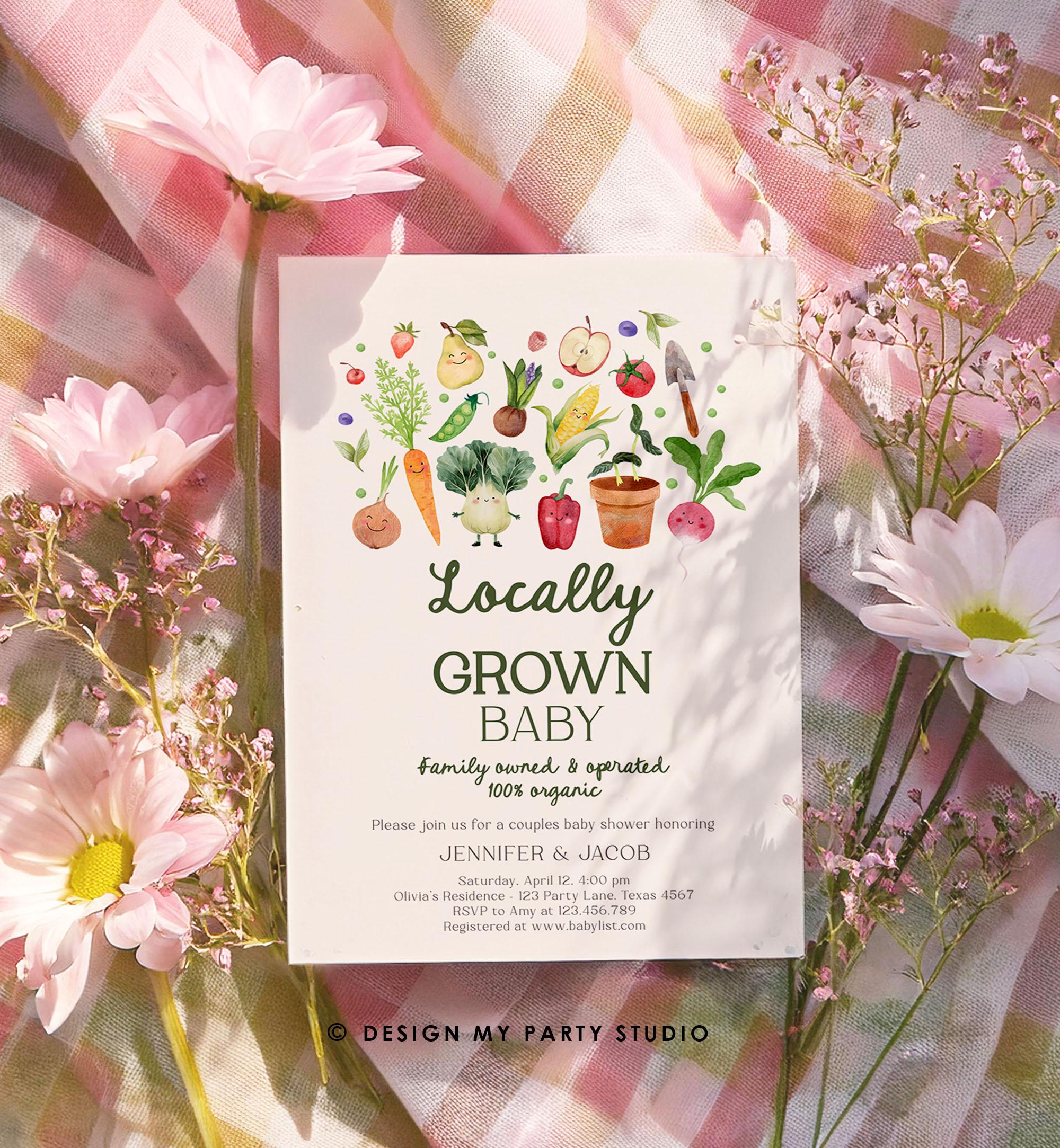 May include: A white invitation with green text and a watercolor illustration of various vegetables and fruits. The text reads &#39;Locally Grown Baby Family owned & operated 100% organic&#39; and includes details for a couples baby shower honoring Jennifer & Jacob.