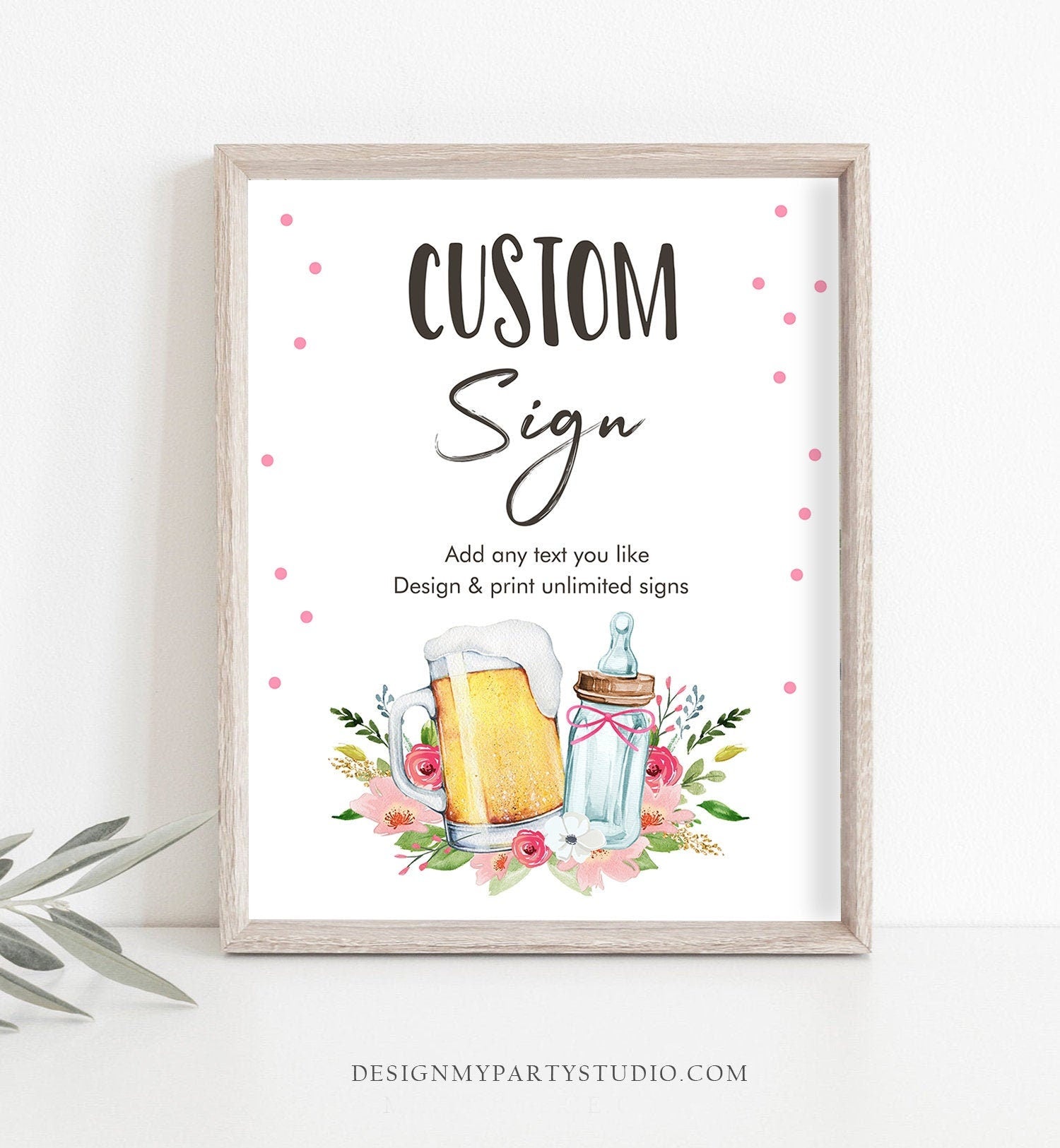 May include: A white sign with the text &#39;CUSTOM Sign&#39; in black. The sign also has the text &#39;Add any text you like Design & print unlimited signs&#39; in black. The sign has a watercolor illustration of a beer mug and a baby bottle with flowers. The sign has a pink and white polka dot border. The bottom of the sign has the text &#39;DESIGNMYPARTYSTUDIO.COM&#39; in black.