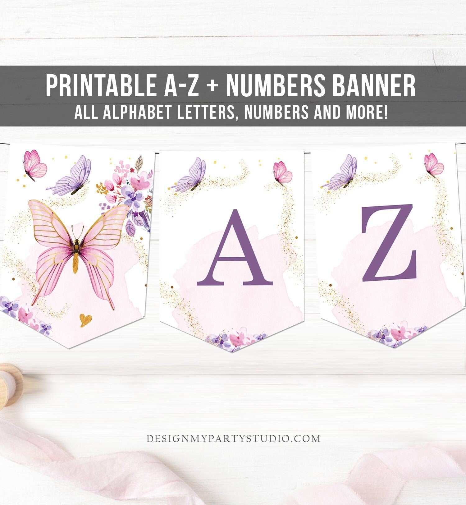 May include: Printable A-Z + Numbers Banner. All alphabet letters, numbers and more! The banner is pink and purple with butterflies and floral designs. The letters A and Z are purple and are on a pink and white background.