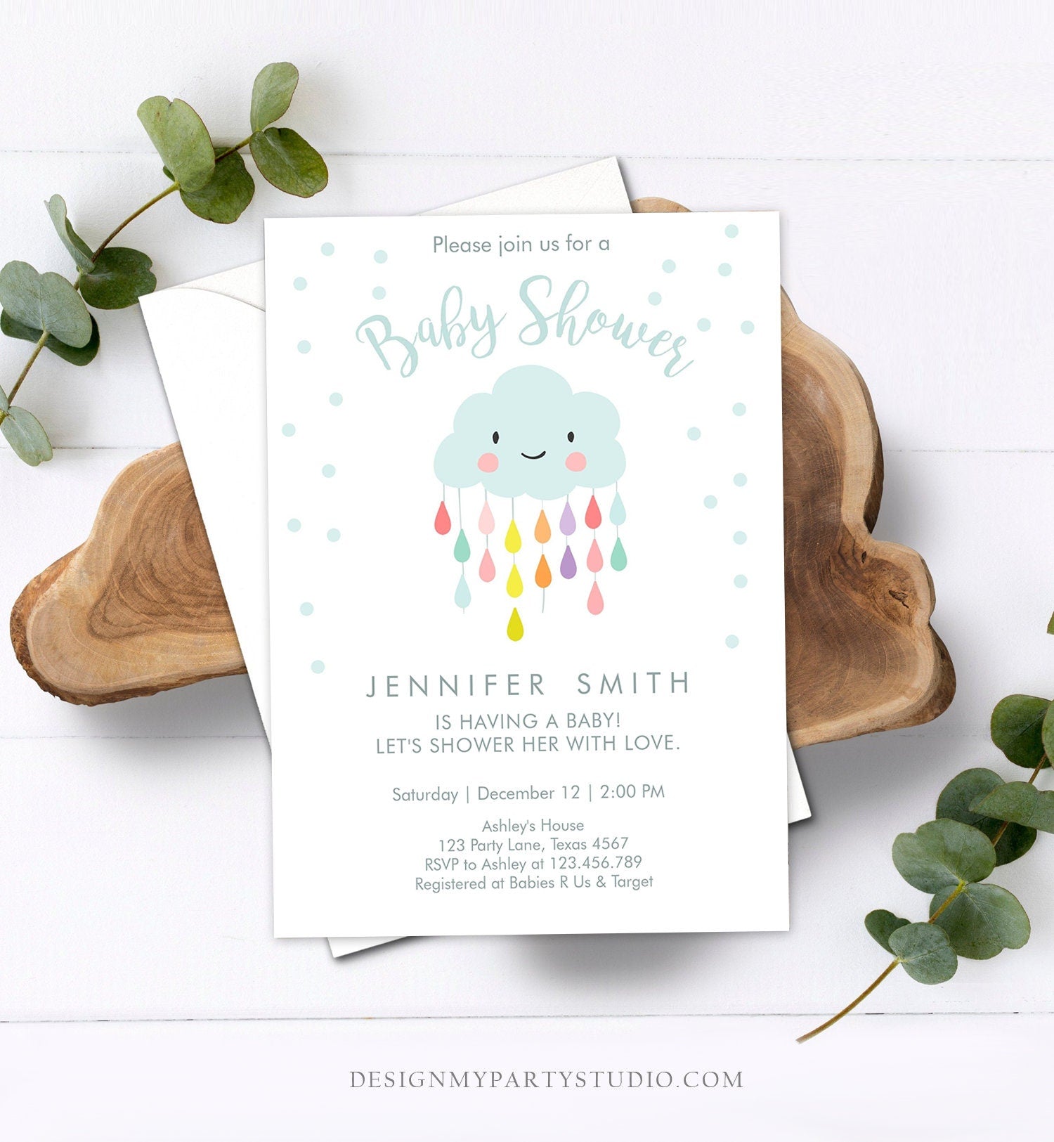 May include: A baby shower invitation with a blue and white color scheme. The invitation features a cartoon cloud with a smiling face and raindrops in rainbow colors. The text on the invitation reads &#39;Please join us for a Baby Shower&#39;, &#39;Jennifer Smith is having a baby! Let&#39;s shower her with love.&#39;, &#39;Saturday | December 12 | 2:00 PM&#39;, &#39;Ashley&#39;s House&#39;, &#39;123 Party Lane, Texas 4567&#39;, &#39;RSVP to Ashley at 123.456.789&#39;, &#39;Registered at Babies R