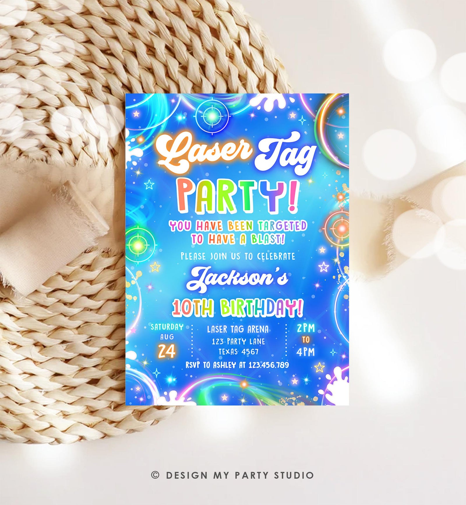 May include: A vibrant invitation for a Laser Tag Party, featuring a blue background with neon accents and the text "Laser Tag PARTY!" The invitation includes details for a 10th birthday celebration, with the date, time, and location.